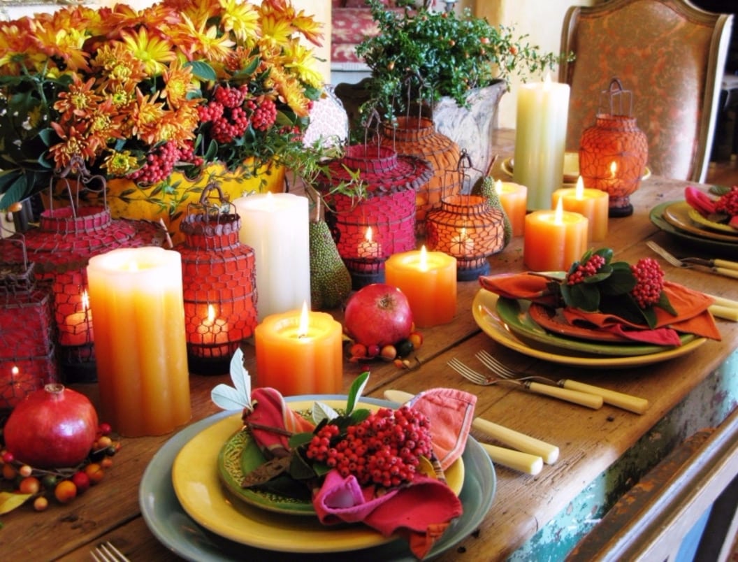 Your Thanksgiving table doesn't have to be all mums and pumpkins. These inexpensive paper lanterns add an unexpected texture and glow.