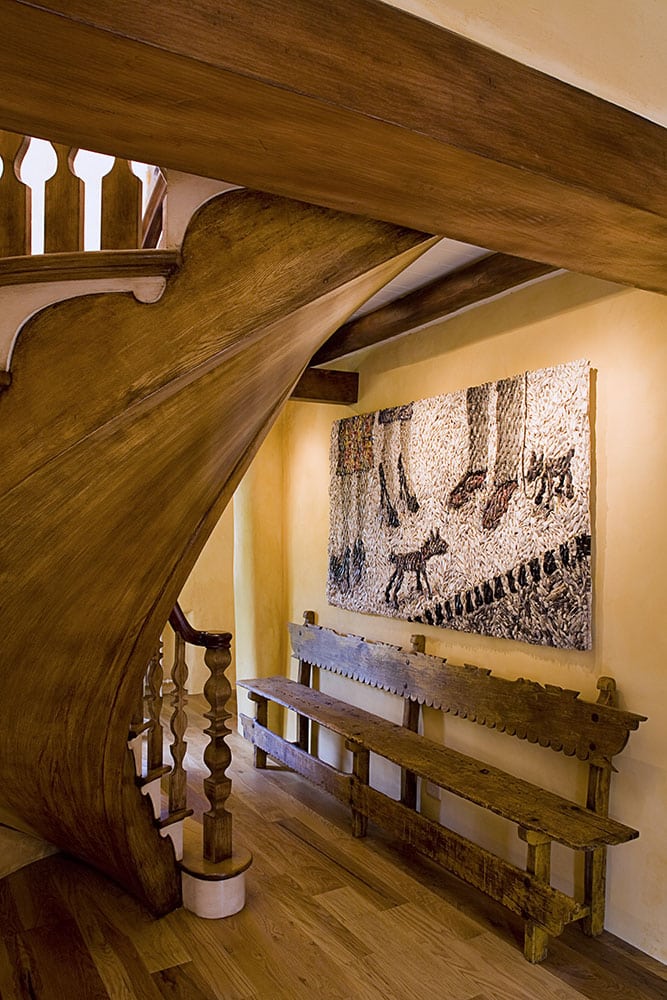The stairways white undercarriage was painted to match the stained pinon balusters