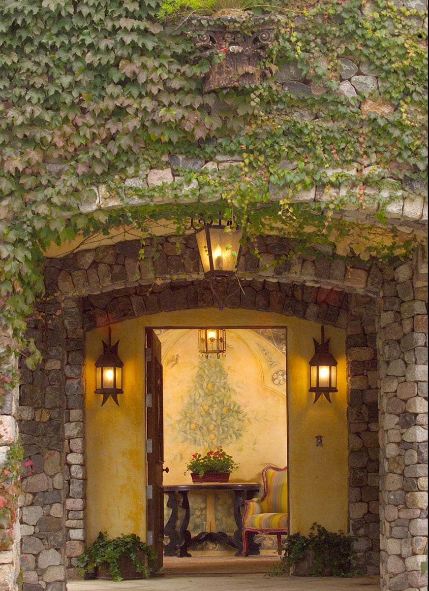 The ivy covered stone entrance welcomes guests at Aurora House.