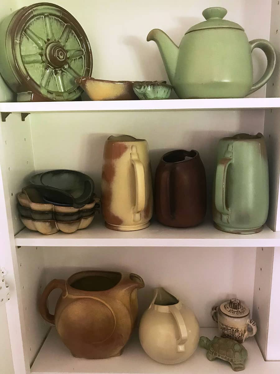 A collection of hand-made Frankhoma pottery from Oklahoma provides unique dishes for serving guests.
