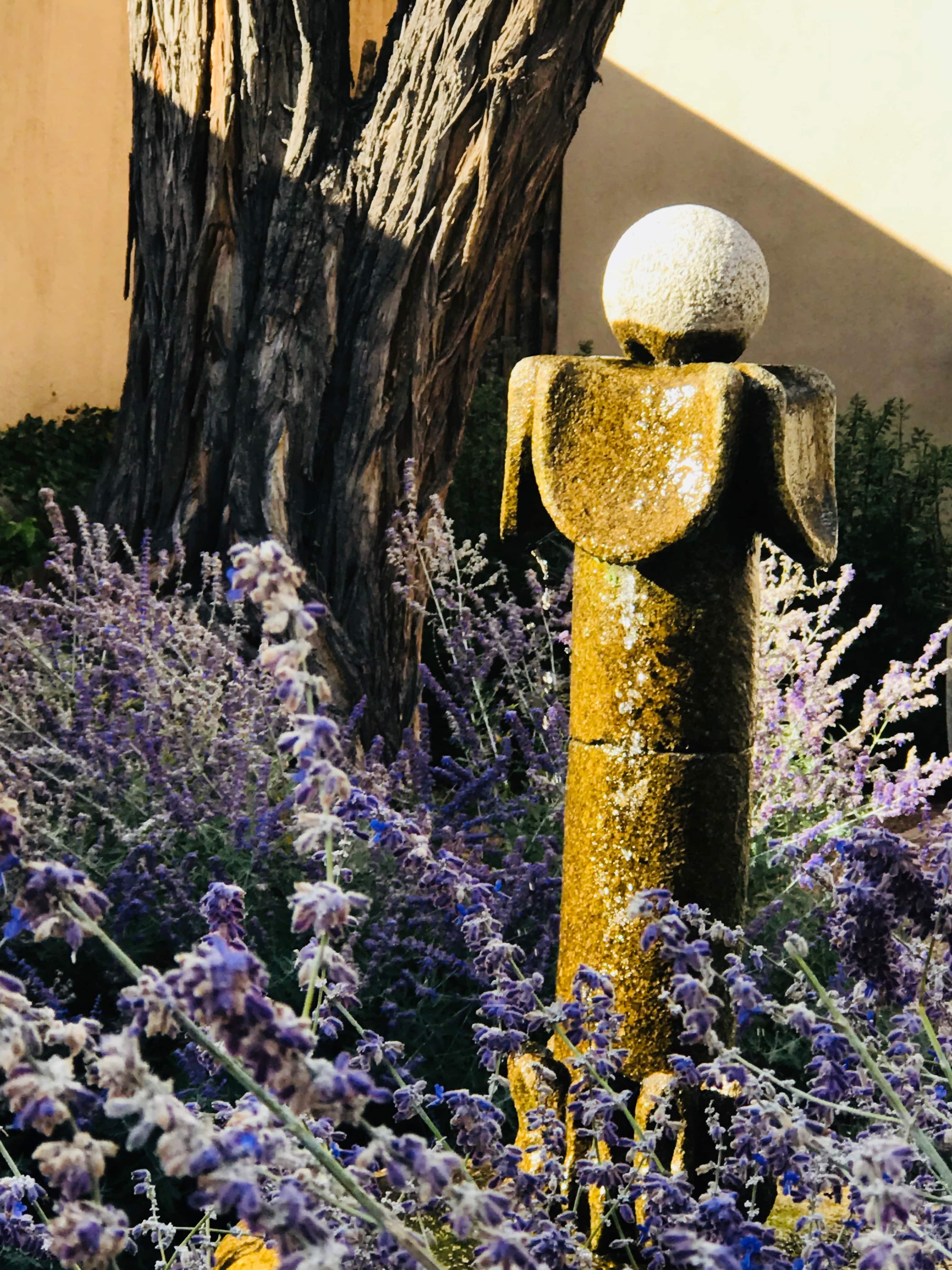 Angel fountain, lavender and tree