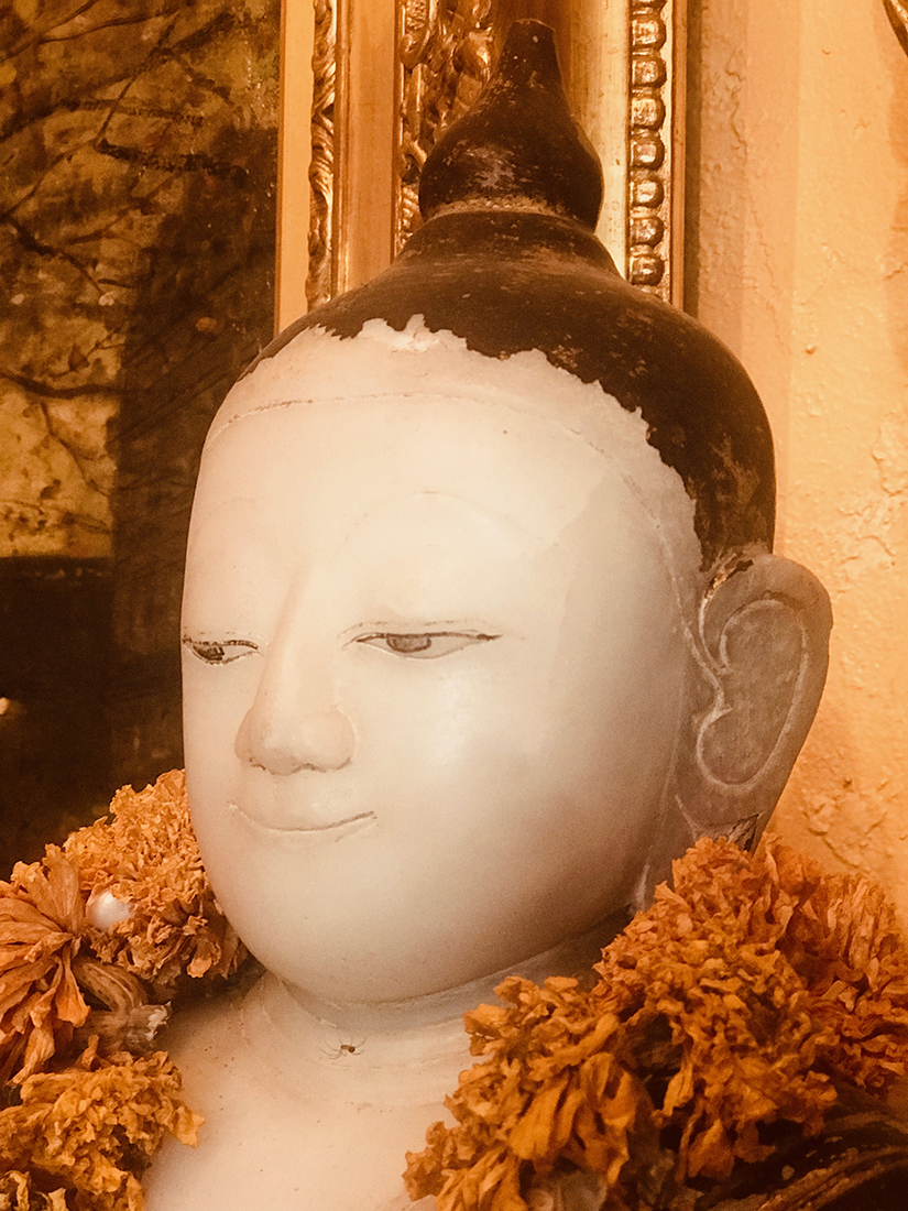 Image of Buddha, a face of tranquility