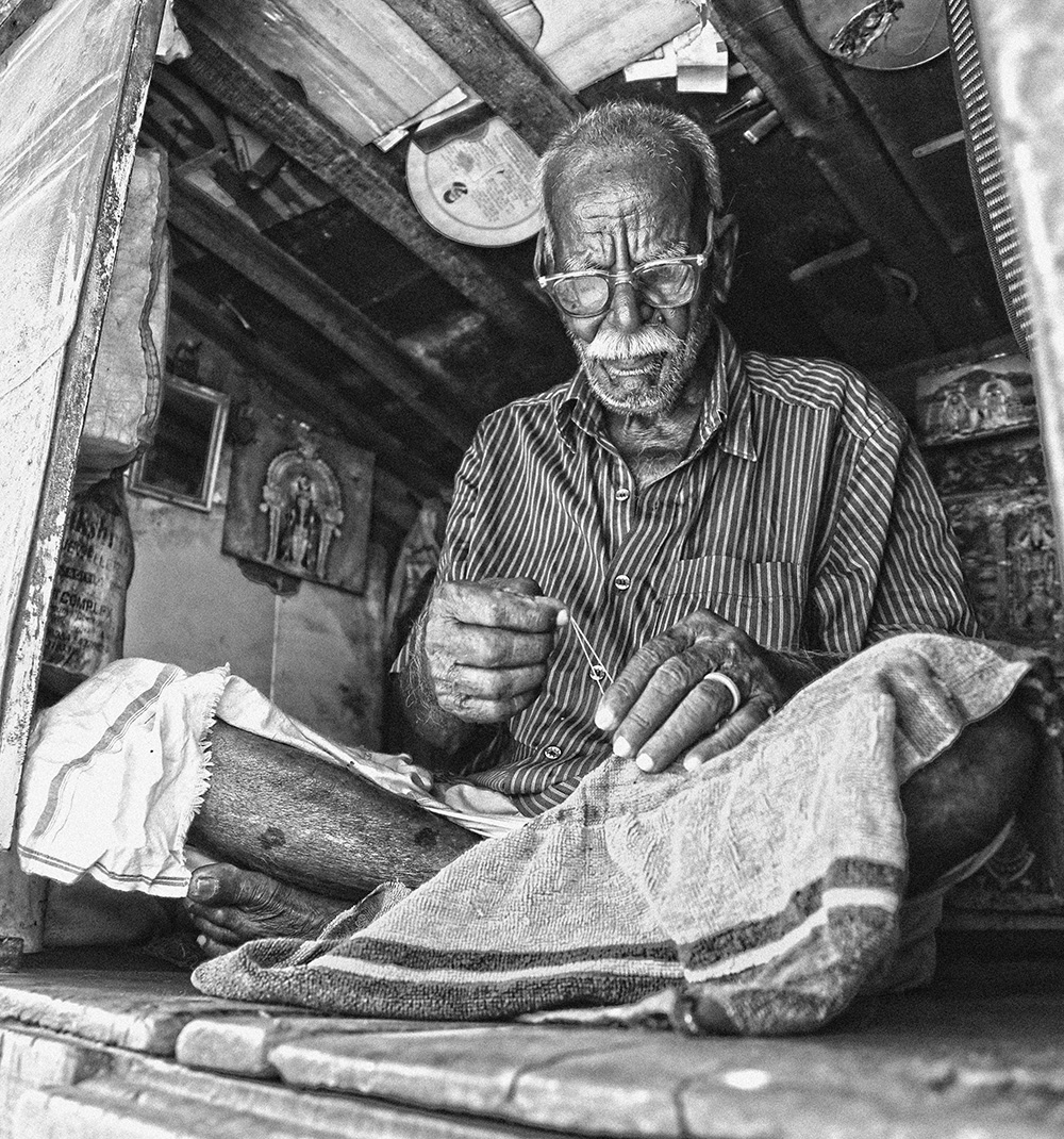 Man weaving cloth