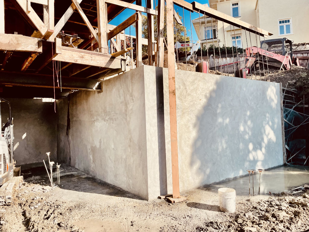 Lower level corner of concrete wall